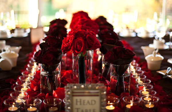 red roses & candles at head table